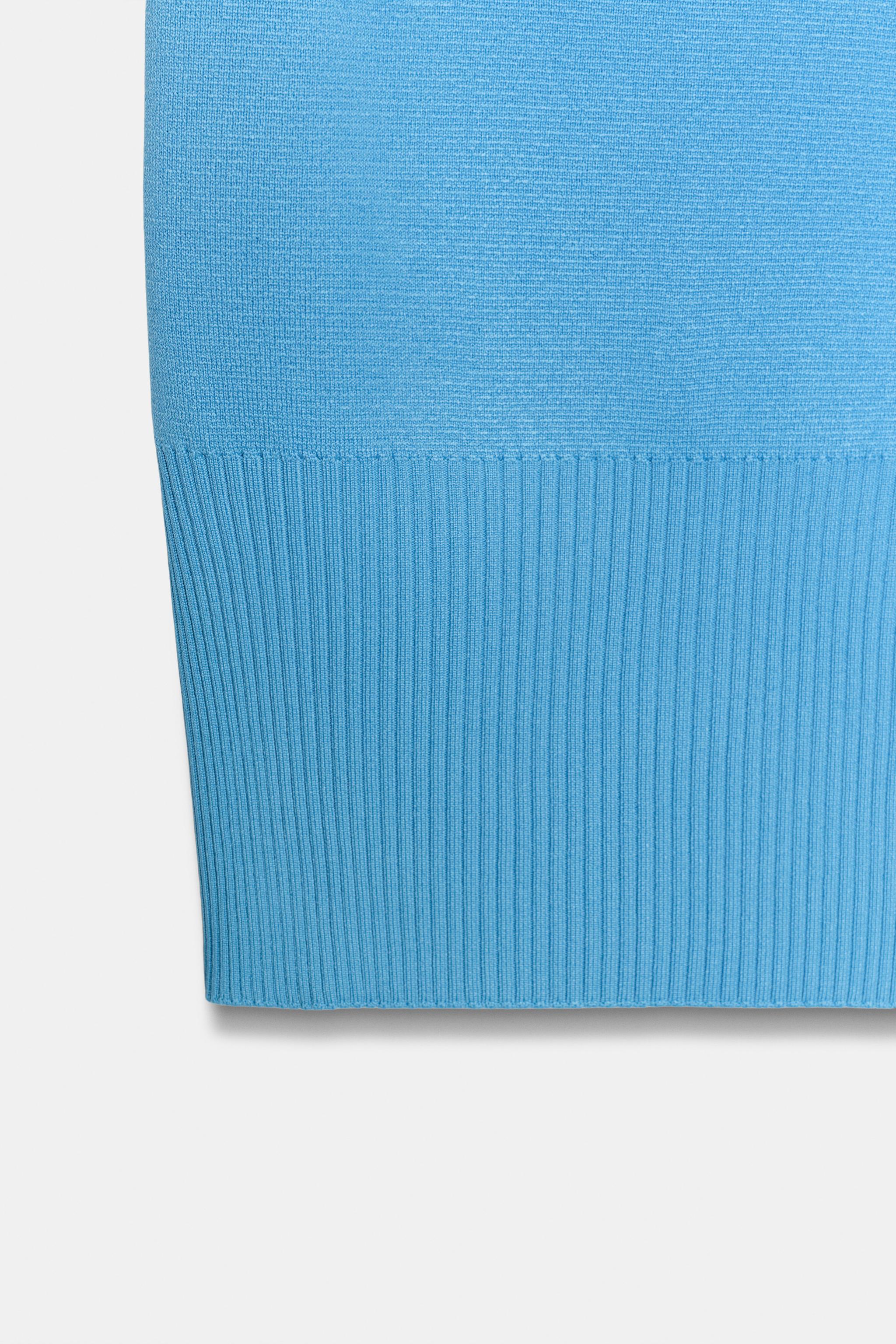 SHOULDER PAD KNIT TOP